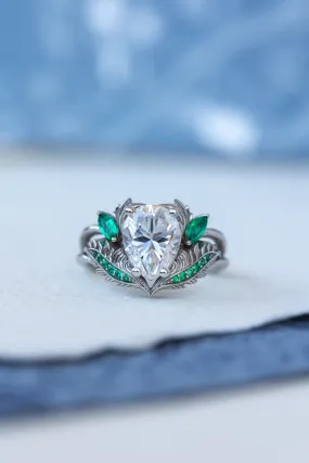 READY TO SHIP: Adonis ring in 14K white gold, moissanite pear cut 9x7 mm, accent moissanite and natural emeralds, AVAILABLE RING SIZES: 4.25-6.25US